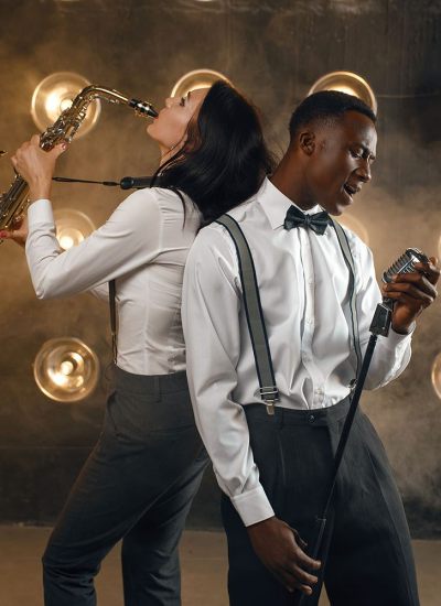 Male jazz performer and female saxophonist